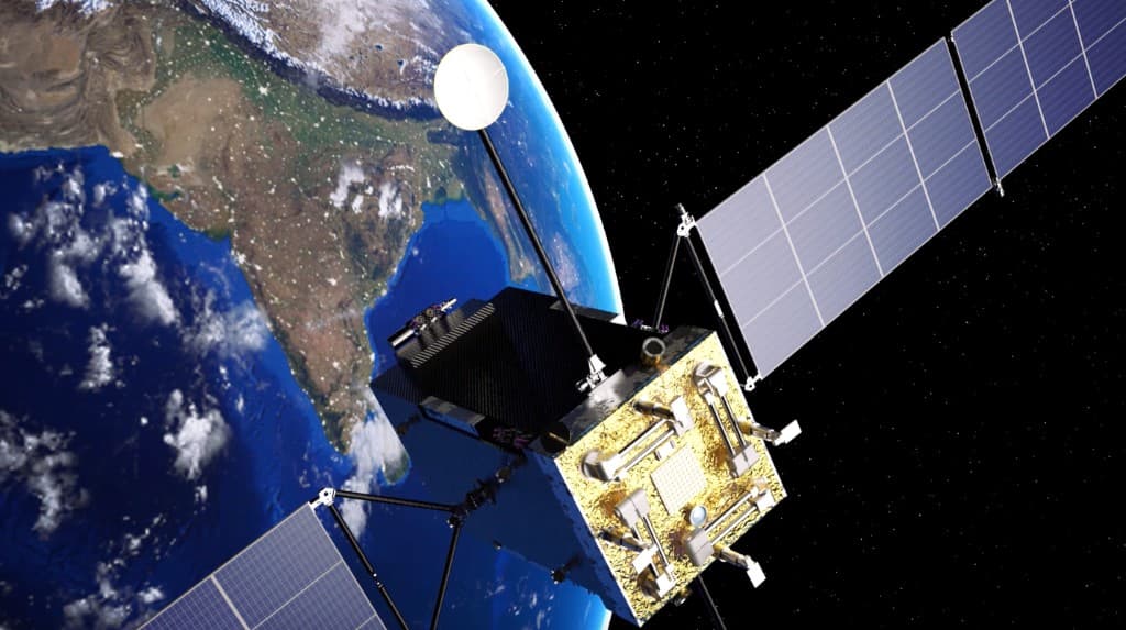 Satellite with solar panels and dish antenna orbiting above Earth against space
